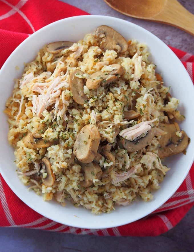 Instant Pot Chicken and Rice with mushrooms on a white plate