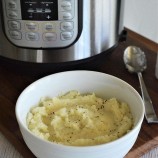 Instant Pot Mashed Cauliflower in a white bowl