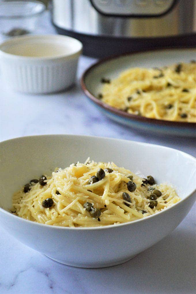Instant Pot Garlic Butter Pasta with Capers on serving bowls