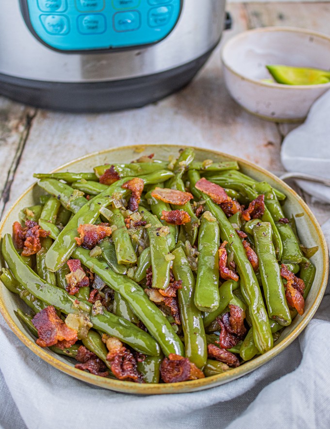 Pressure cooker green beans with bacon in a serving bowl