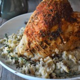 Instant Pot Roast Turkey over mashed potatoes on a white serving platter